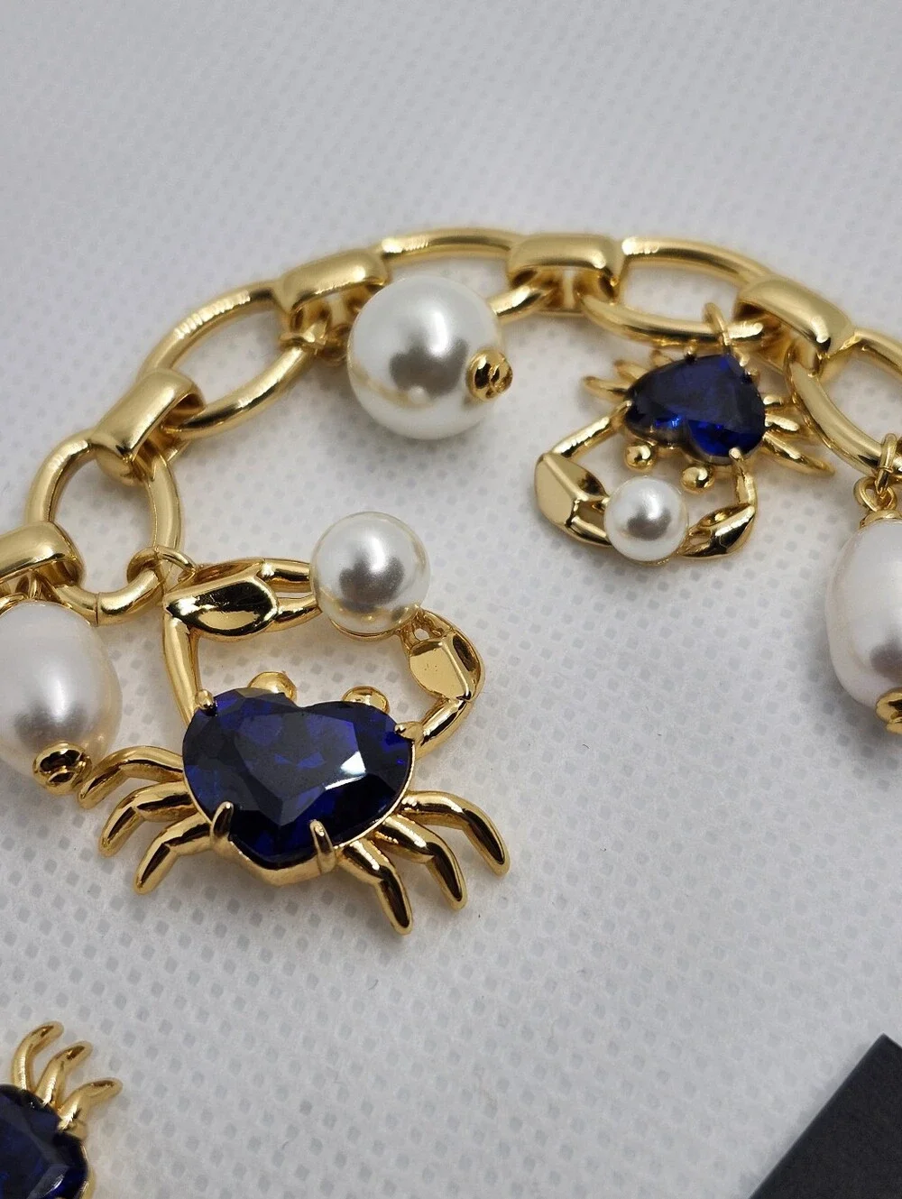 Kate Spade Crab Gold Bracelet with Blue and White Accents - Picture 11 of 11